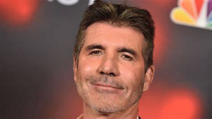 Simon Cowell's son Eric is all grown up in holiday snap! HELLO!